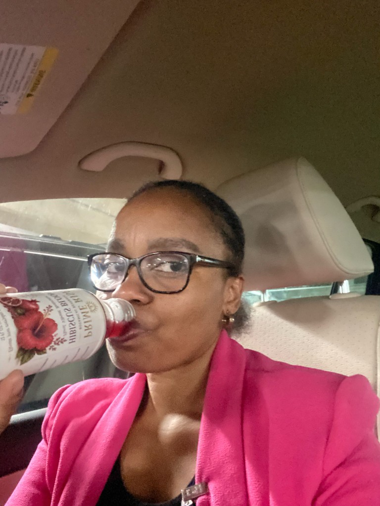 Customer enjoying Prime Rise Hibiscus Bloom in the car