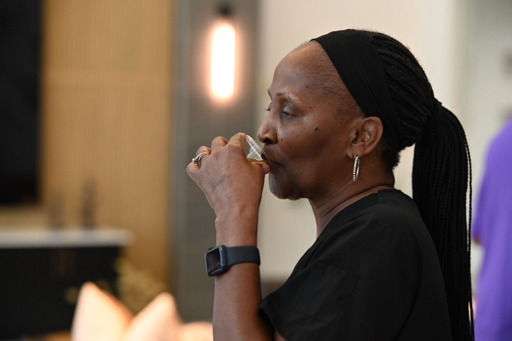 Customer tasting Prime Rise at a community event